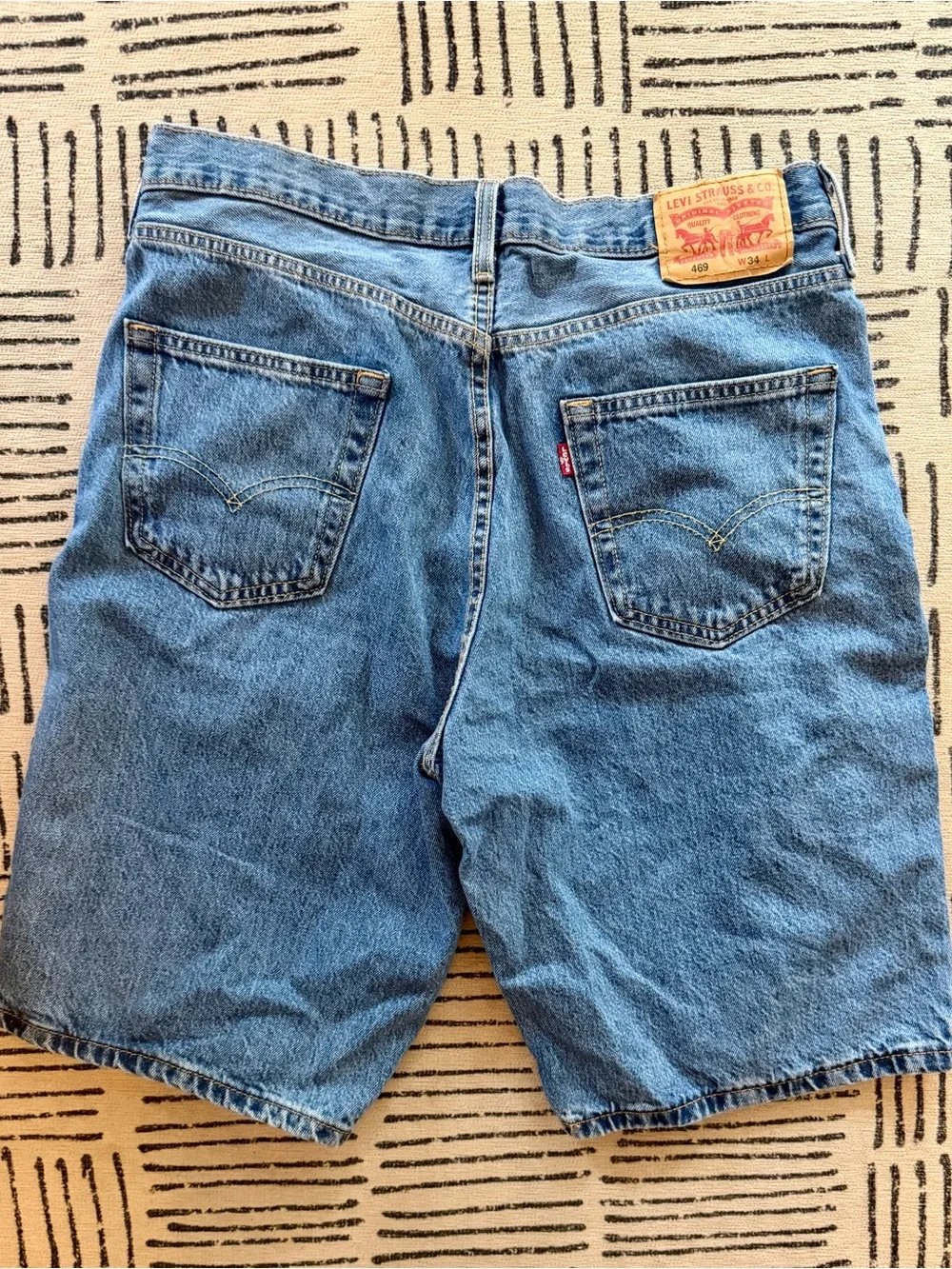 Men’s Levi's 469 mid wash blue baggy denim shorts